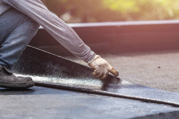 Professional Exterior Waterproofing technician working in Rockford, IL